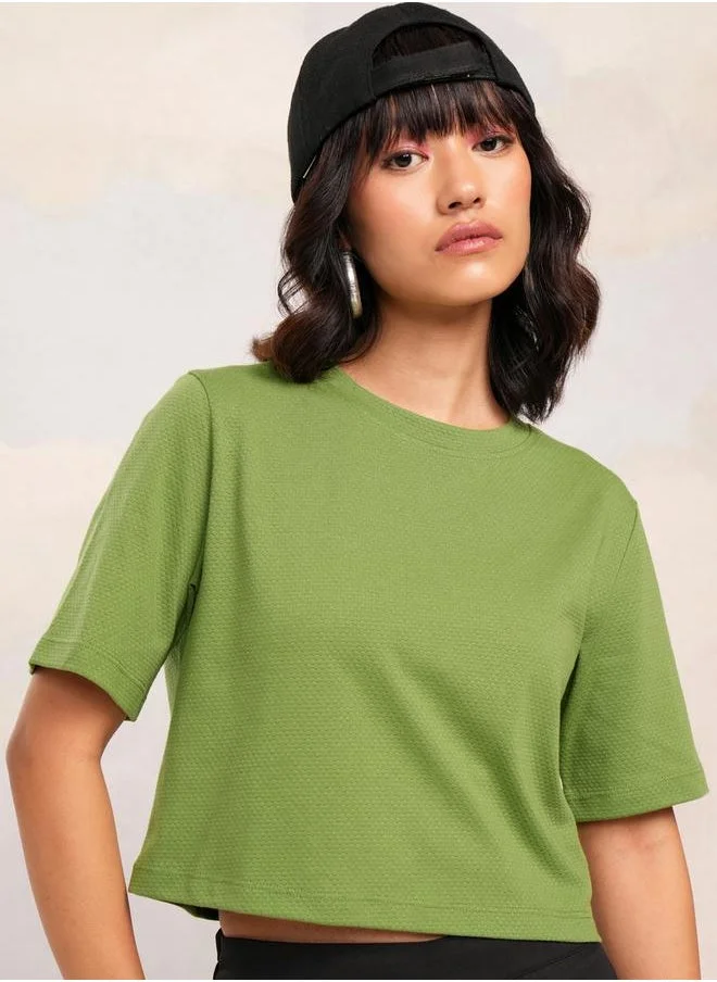 Tokyo Talkies Solid Round Neck Crop Top by Styli