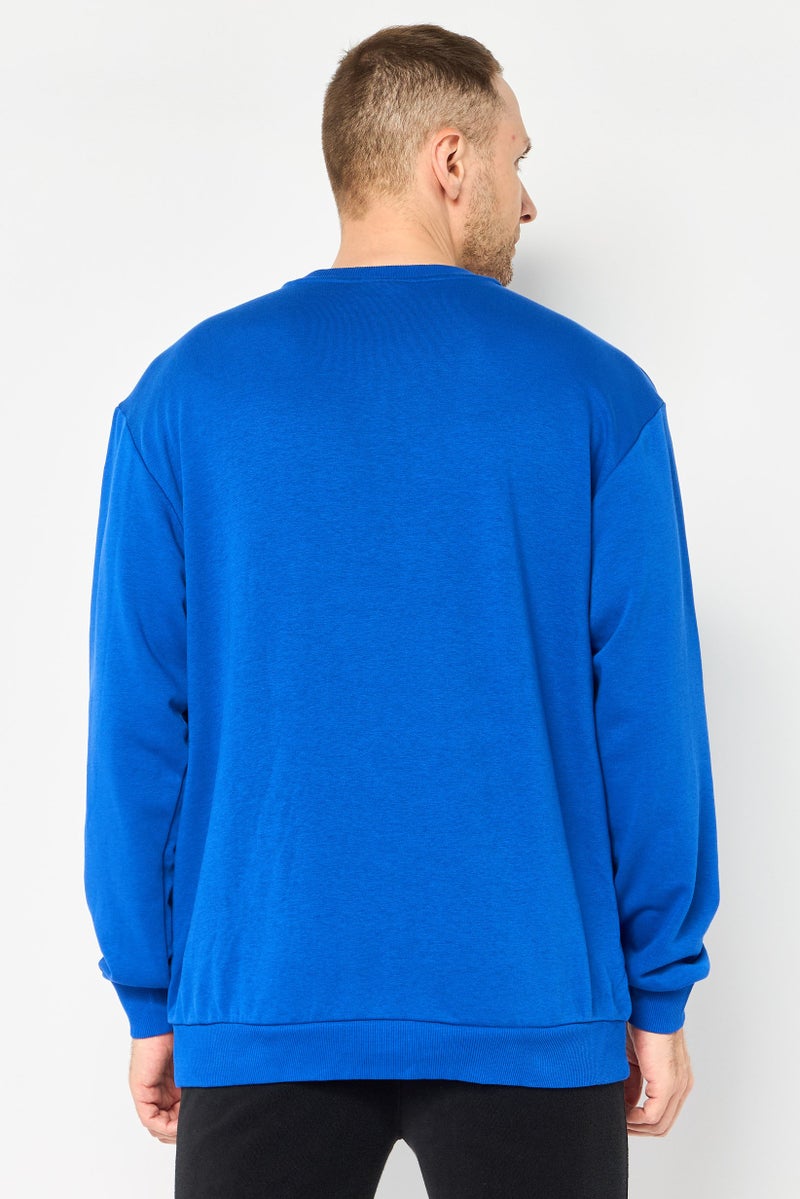 Adidas سويت شيرت رياضي للرجال بأكمام طويلة مناسب في الهواء الطلق، أزرق ملكي - Image 4