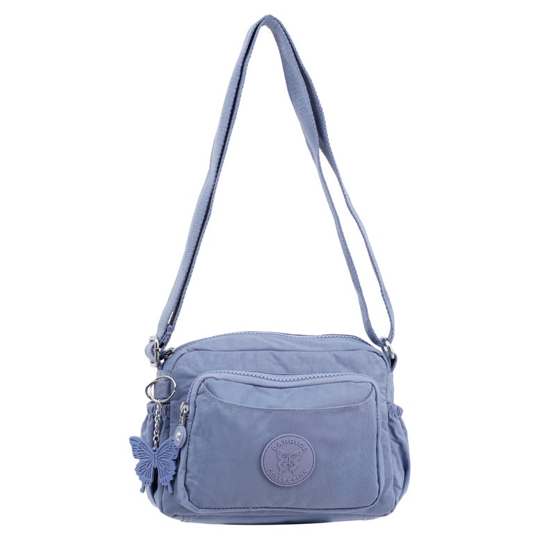 مجموعة كابريس شنطة كروس صغيرة للجنسين من كابريس كوليكشن – لافندر، خفيفة ومضغوطة، نايلون مقاوم للماء، سعة 3 لتر - Image 1