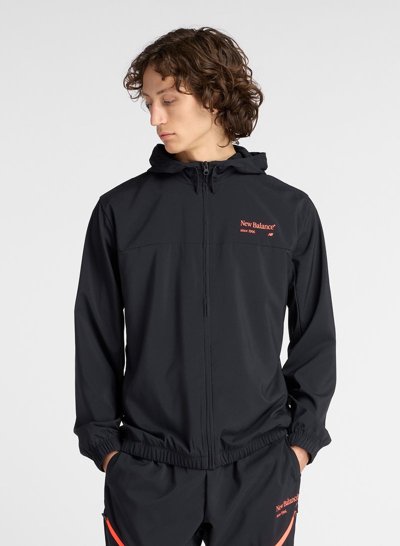New Balance Reimagined Woven Graphic Jacket - Image 1