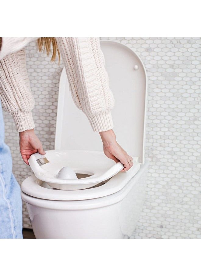 the FIRST years Soft Grip Potty Training Toilet Seat Attachable Toddler Potty Training Seat For Adult Size Toilet Gray  - Image 3