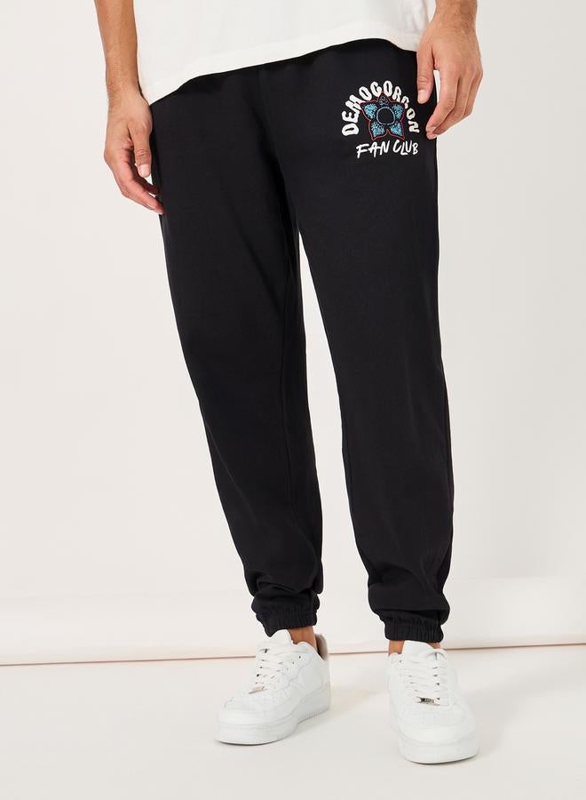 Styli Stranger Things Character Graphic Print Oversized Joggers  - Image 1