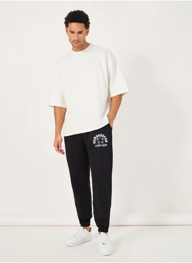 ستايلي Stranger Things Character Graphic Print Oversized Joggers