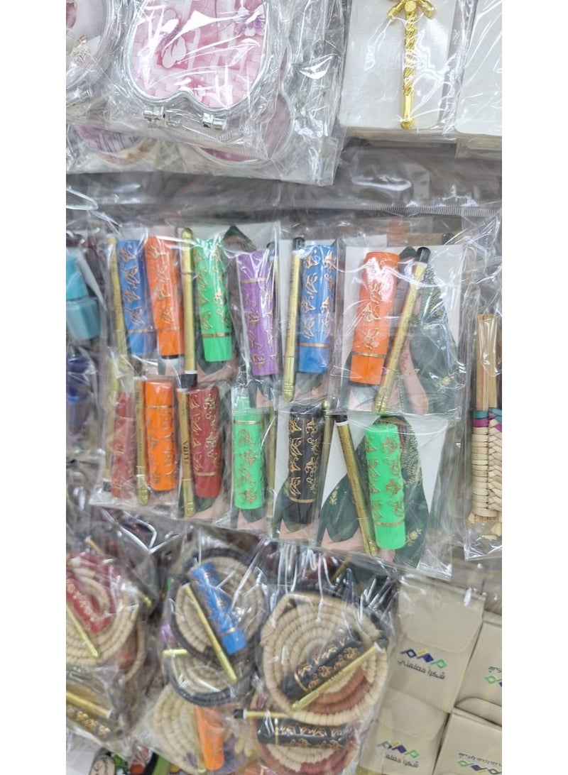 Ghamra card with lipstick and eyeliner, a dozen