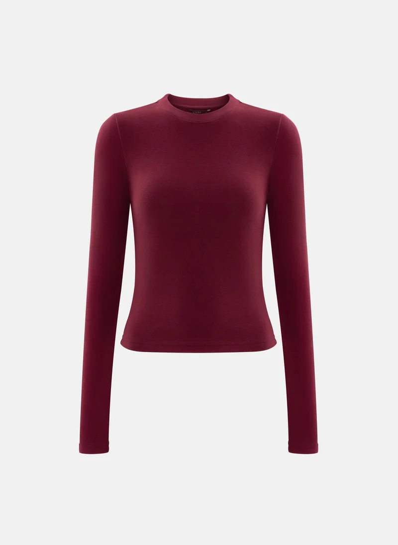 ليتشي بلوزة ذات اكمام طويلة ولون احادي