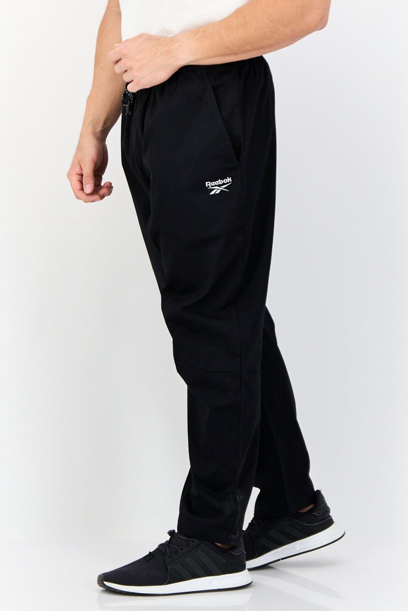 Reebok Men Sportswear Fit Embroidered Logo Outdoor Track Pants, Black - Image 4