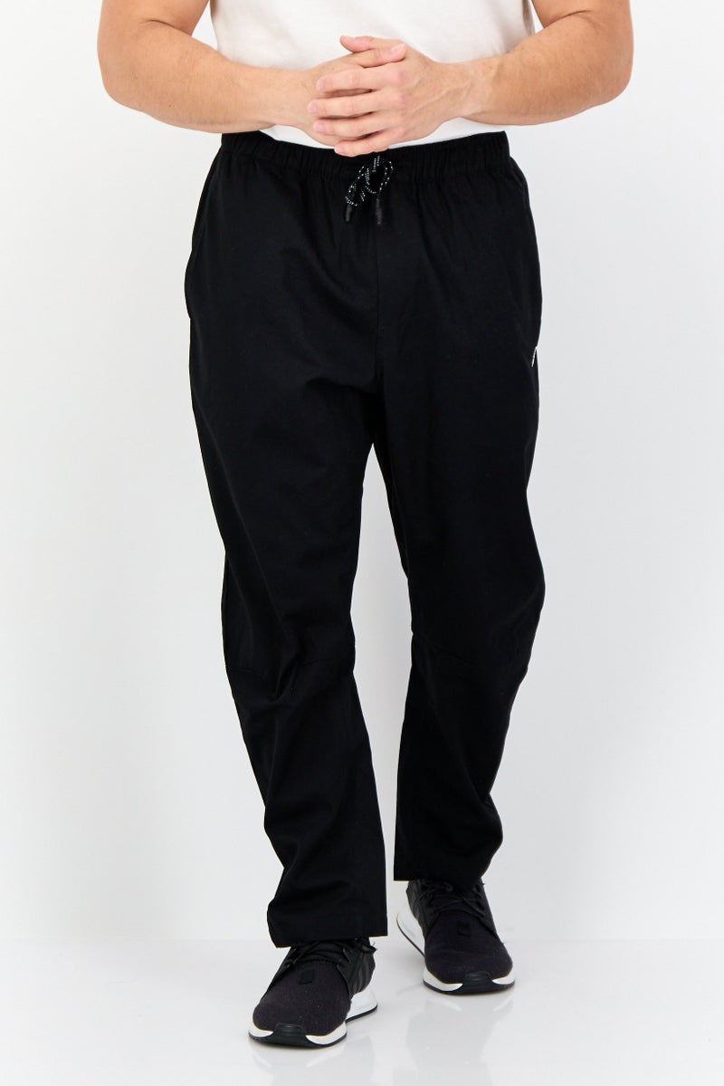 Reebok Men Sportswear Fit Embroidered Logo Outdoor Track Pants, Black - Image 1