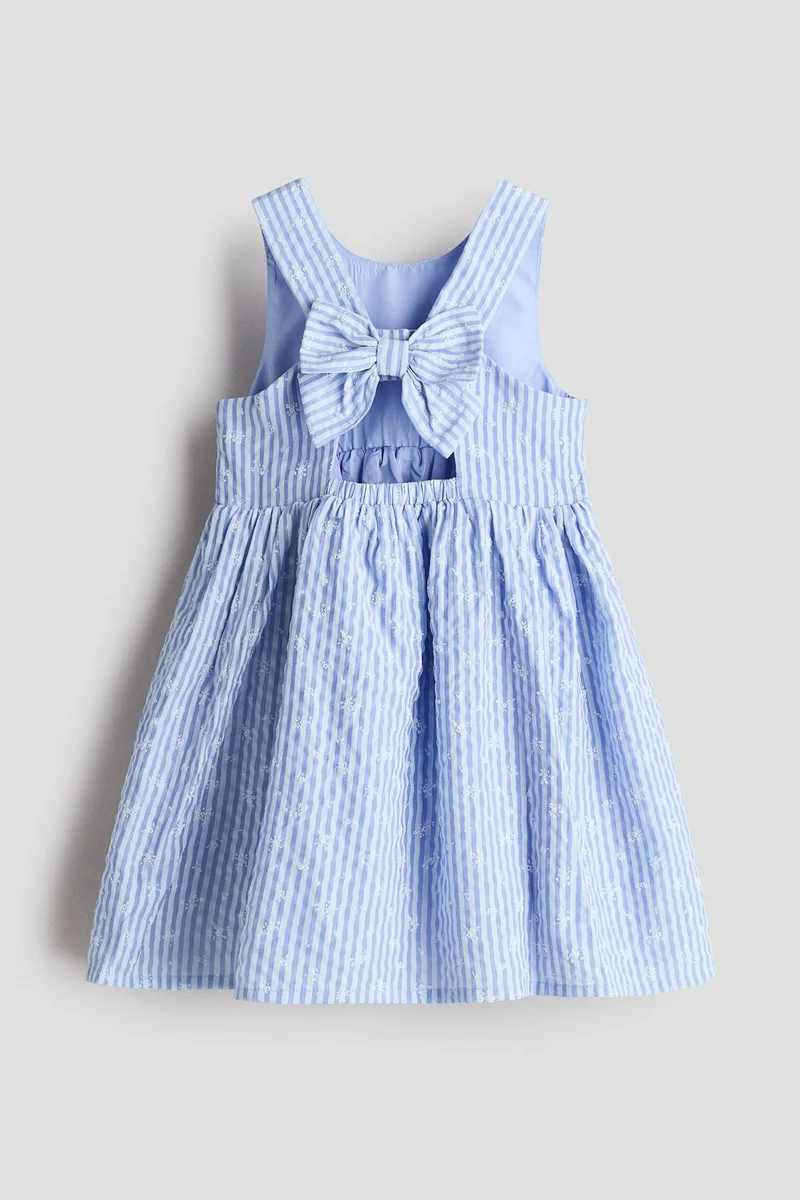 اتش اند ام فستان سيرساكر بتفصيلة فيونكة