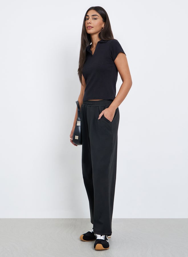 ستايلي سراويل واسعة الساق للنساء من ستايلي بلون أسود بقصة برميلية - Image 1