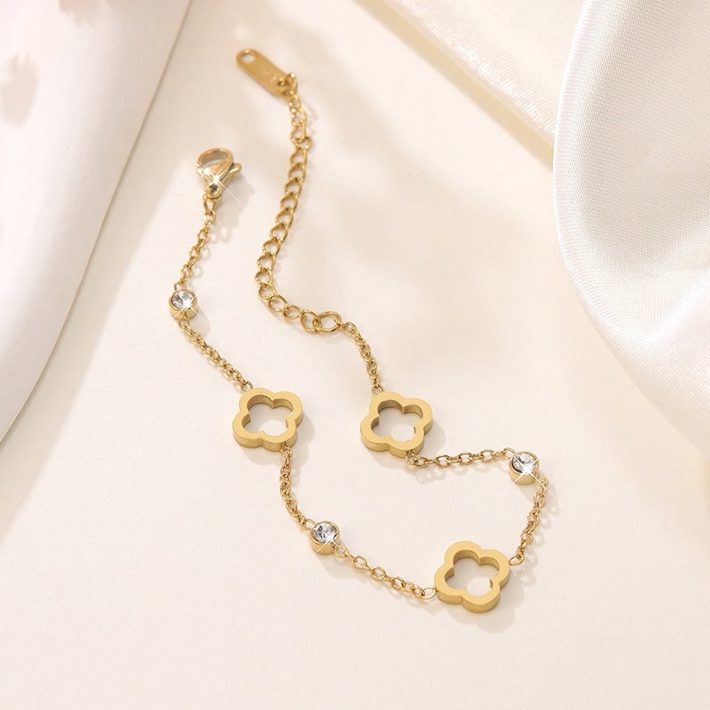 Luxury Stainless Steel Four-Leaf Clover Bracelet with 18K Gold Plating and Zirconia - Elegant, Versatile, and Trendy