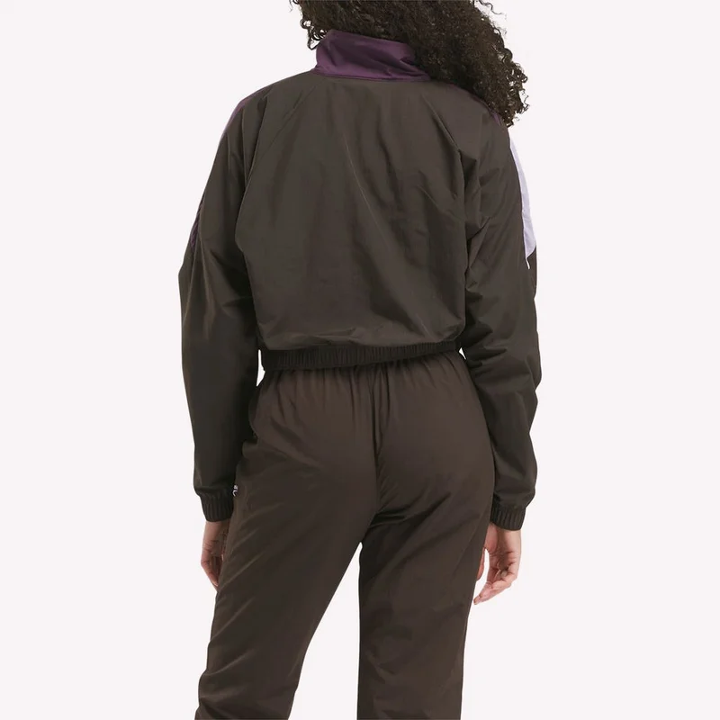ريبوك Stay bold with the Reebok Classics Women's Track Jacket. Retro vector design, vibrant colors, and eco-friendly recycled fabric for style and look.