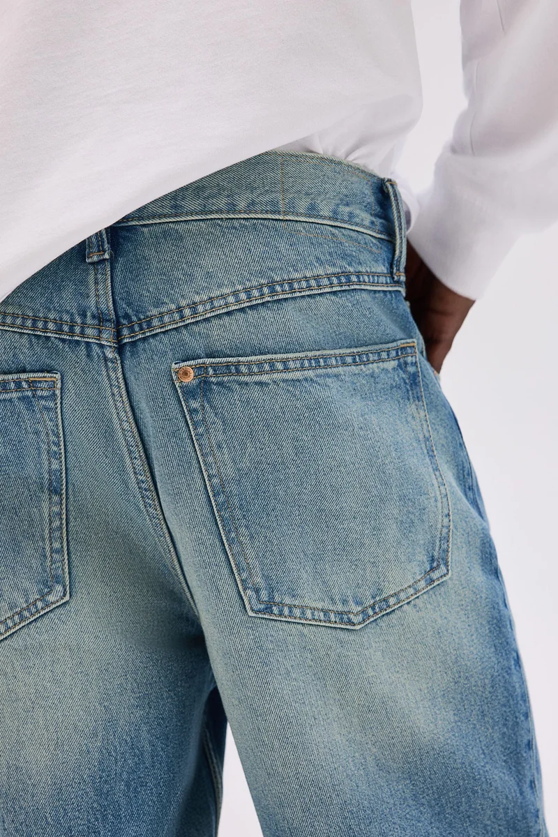 اتش اند ام جينز بخصر عالي وقصّة بوت كت