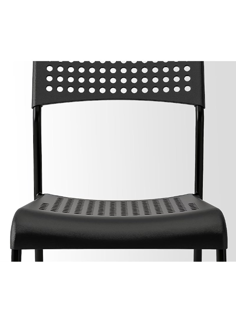 Sharpdo A table with a strong metal base and a wooden surface coated with melamine, featuring an elegant design along with a set of 4 lightweight and durable modern chairs that can support a weight of 120 kg, with steel legs coated with polyester, suitable for living rooms, bedrooms, kitchens, and offices. - Image 5