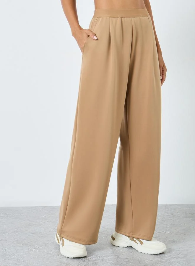 Styli Styli Solid Mid Rise Wide Leg Pants