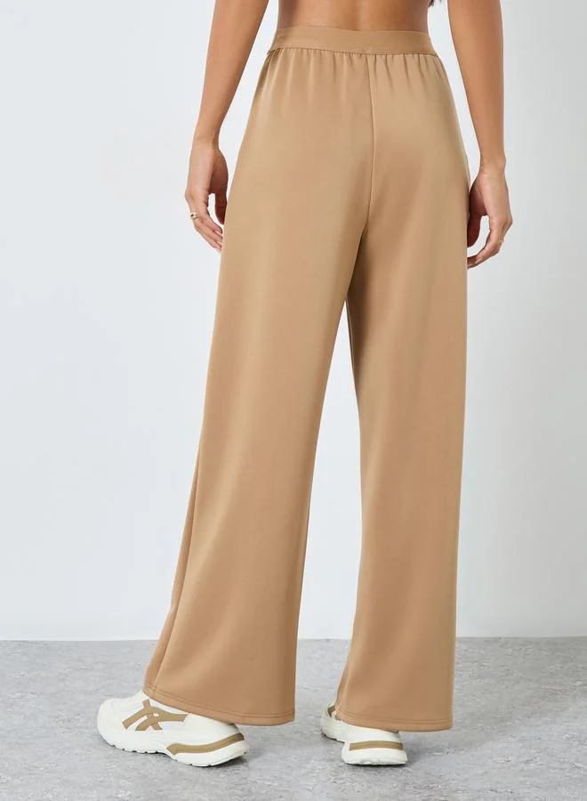 Styli Styli Solid Mid Rise Wide Leg Pants