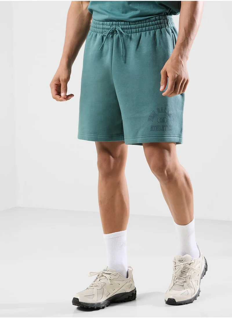 New Balance Sport Essentials Fleece Graphic Short 7"