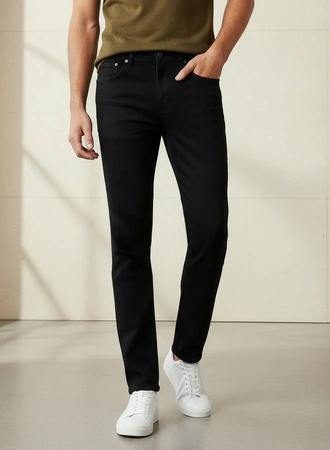 سبلاش فيڤ جينز رجالي بقصة ضيقة وخصر مرن وجيوب