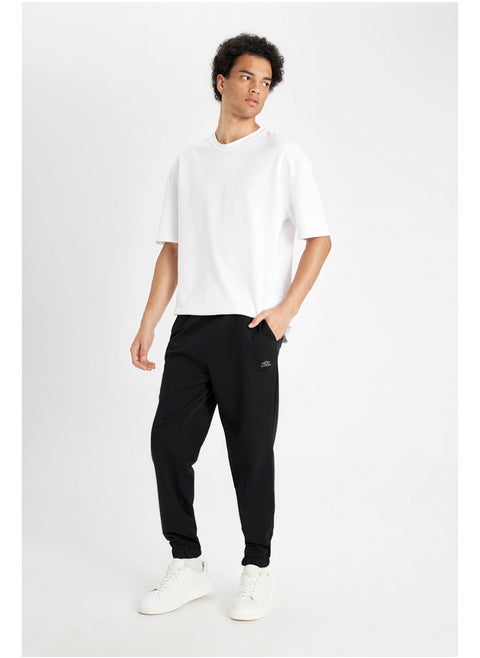 Man Regular Fit Knitted Trousers