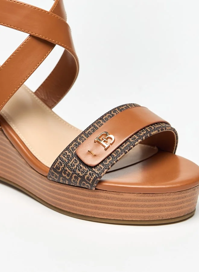 فلورا بيلا من شو إكسبرس Women's Cross Strap Wedge Heeled Sandals with Buckle Closure