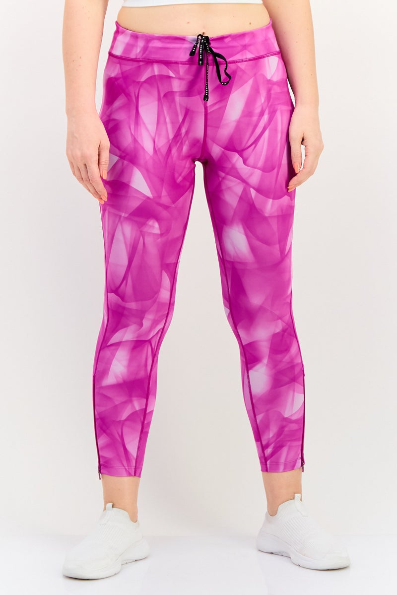 Nike سروال رياضي ضيق 3/4 للنساء بتقنية دري-فيت، متعدد الألوان - Image 1