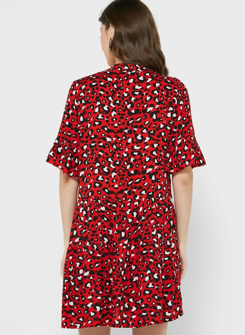 Ginger Shirred Neck Flared Cuff 
Tiered Printed Dress