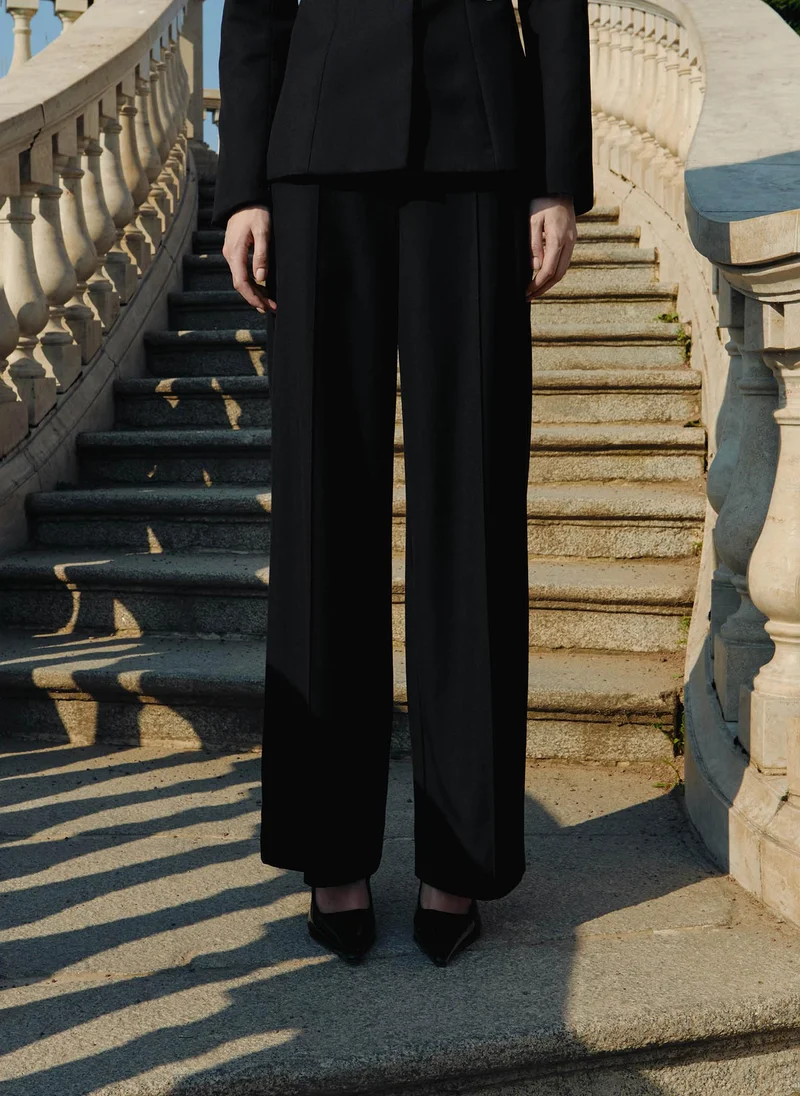 Lichi Loose-fitting trousers with creases