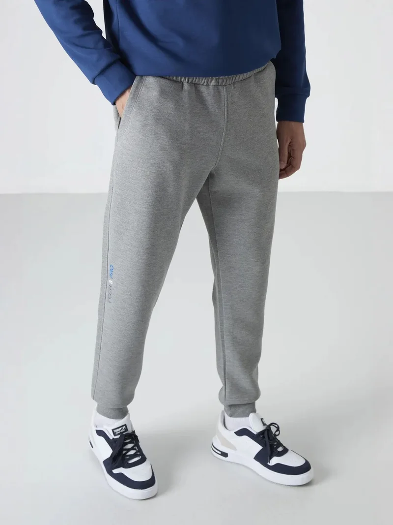 تومي لايف TOMMY Men's Slim Jogger Sweatpants