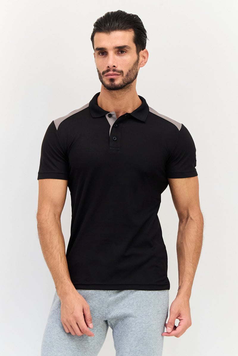 PUMA تي شيرت بولو للرجال بأكمام قصيرة مناسب للرياضة في الهواء الطلق، أسود - Image 1