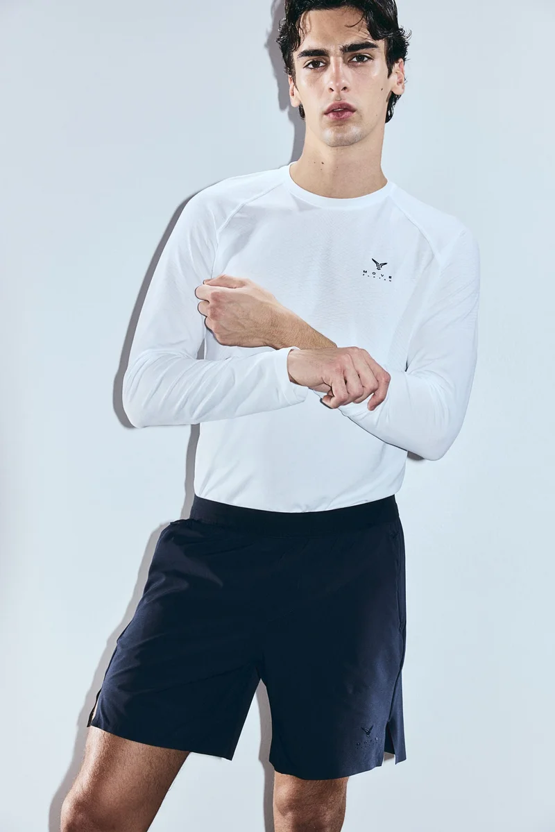 H&M Mid-length sports shorts with DryMove™