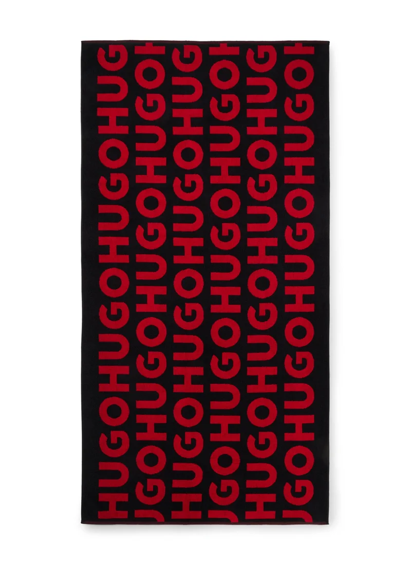 هوجو Cotton-terry beach towel with logo pattern
