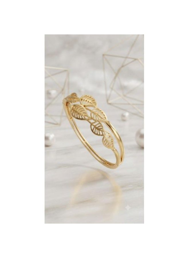Stainless Steel Bangle with Gold Finish and Vine-Inspired Openwork Leaf Design