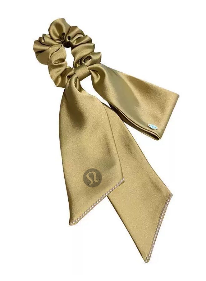 Lululemon Gold Satin Scarf Scrunchie - Luxury Silk Hair Tie with Bow Detail & Pearl Trim for Styling & Hair Care - Image 1