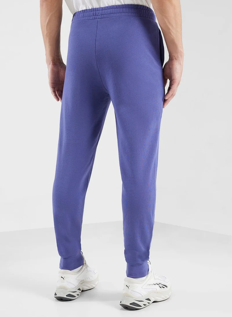 PUMA purple Essential Elevated Logo Sweatpants for Men | Best Price UAE