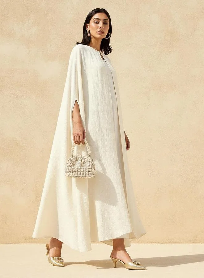 Iconic Iconic A-line Maxi Dress with Textured Design and Button Detail Cape