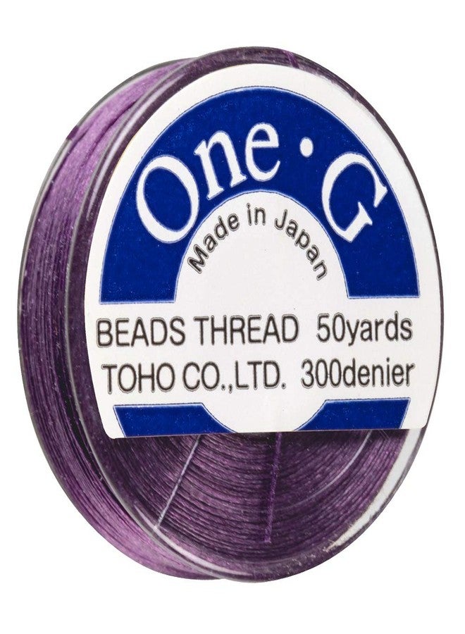 TOHO One-G Beading Thread, 50 Yard Bobbin (Purple) - Image 1