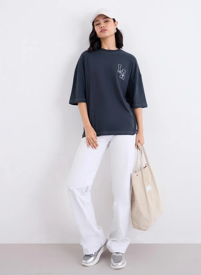 ستايلي تيشيرت فضفاض بطبعة جرافيك