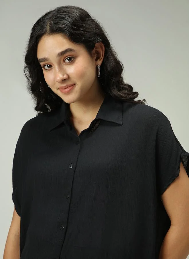 Outzidr  Black Solid Flowy Shirt for Women | Best Price UAE