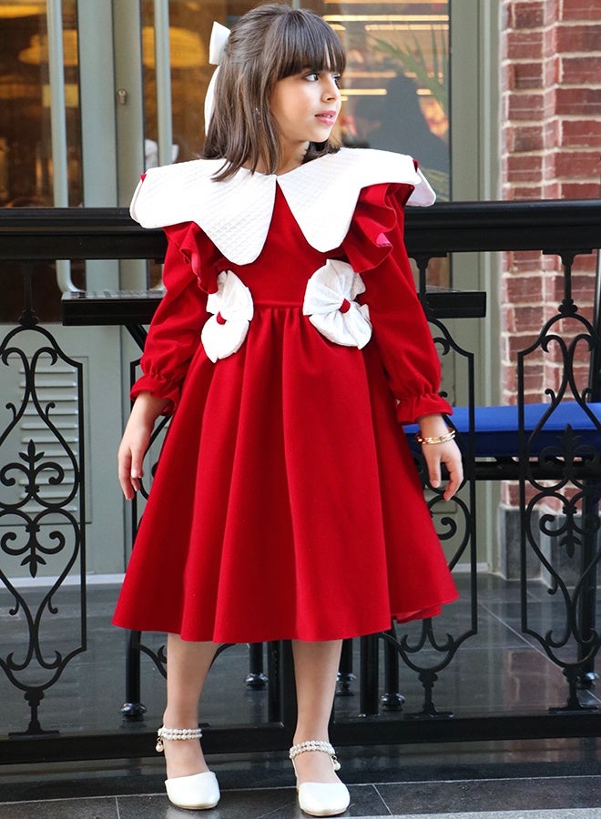 HAWRAA ABAYA A red velvet girls’ dress featuring a luxurious design with distinctive, elegant details - Image 1
