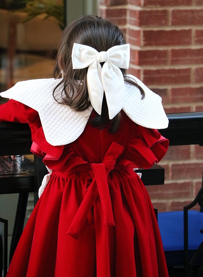 HAWRAA ABAYA A red velvet girls’ dress featuring a luxurious design with distinctive, elegant details - Image 4