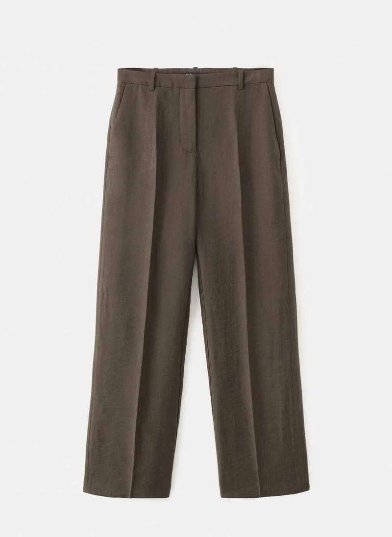 MANGO  Mid-rise lyocell trousers for Women | Best Price UAE