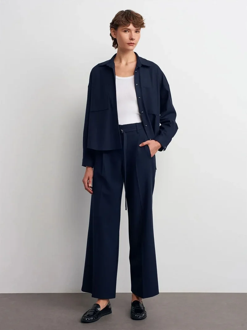 ديلفين DILVIN Wide-leg Belted Crepe Trousers