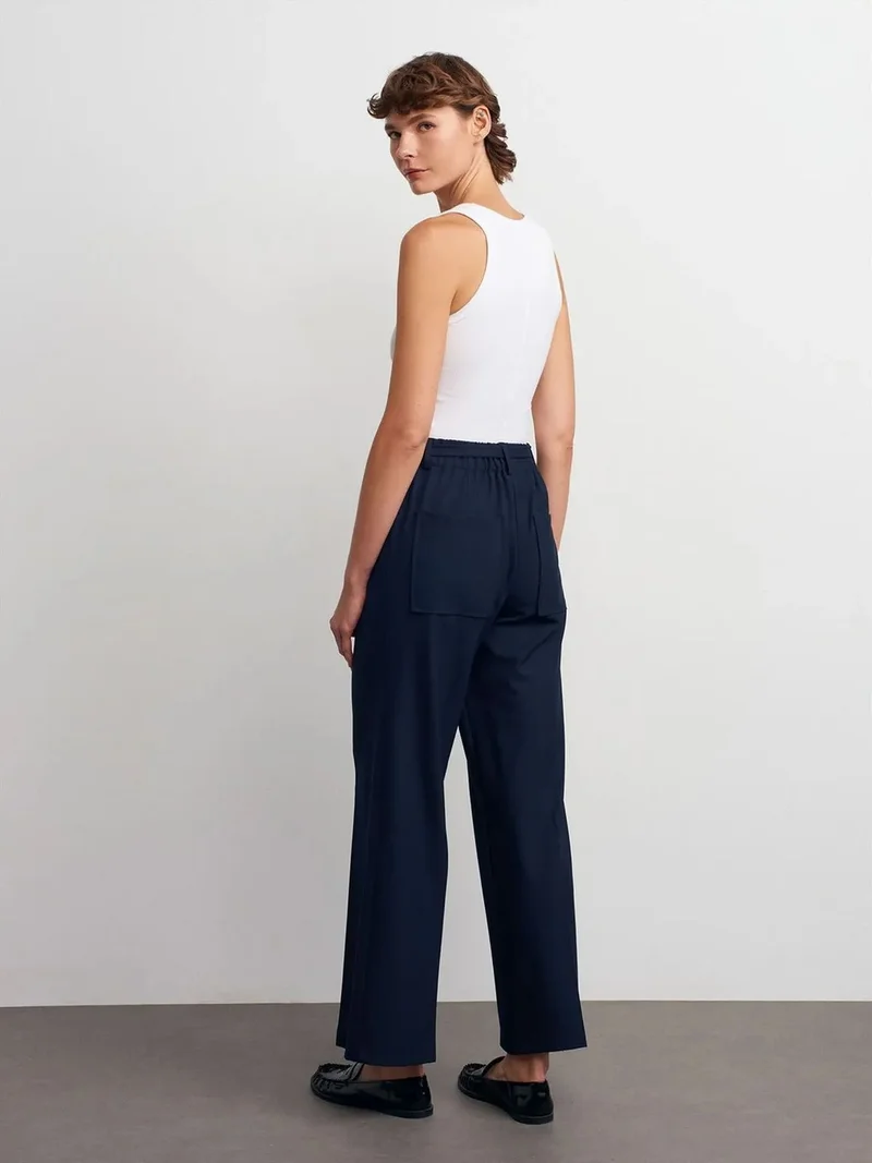 ديلفين DILVIN Wide-leg Belted Crepe Trousers