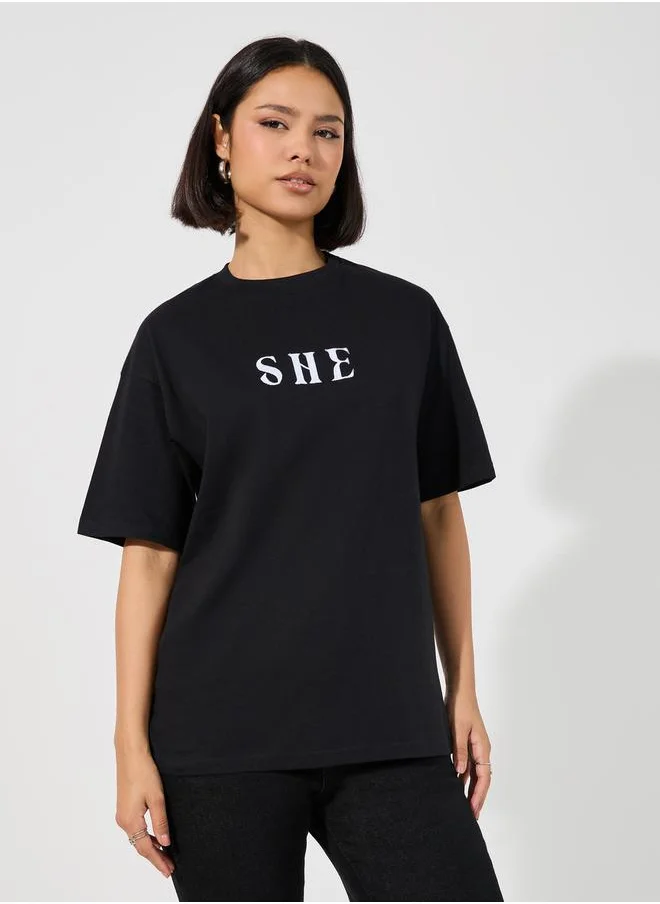 Styli Oversized Embroidered She Slogan T-Shirt