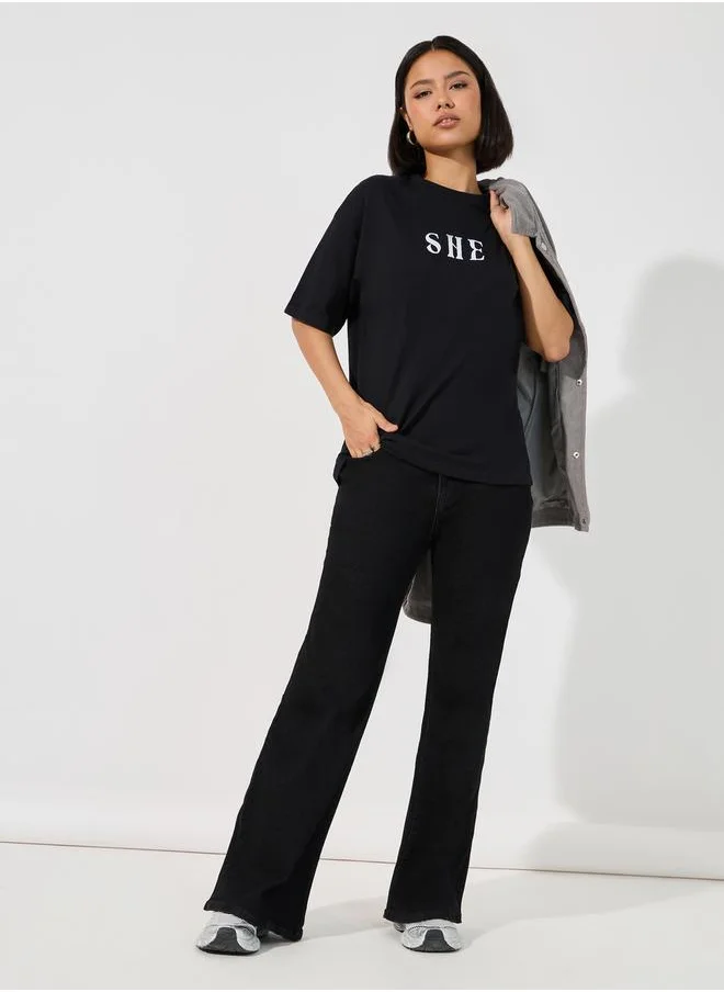 Styli Oversized Embroidered She Slogan T-Shirt