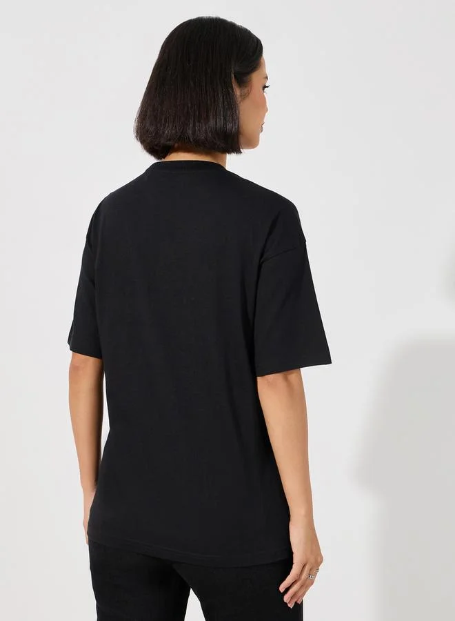 Styli Oversized Embroidered She Slogan T-Shirt