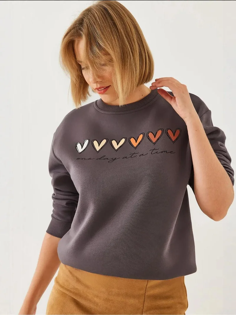 LUCCI Heart Patterned Crew Neck Sweatshirt