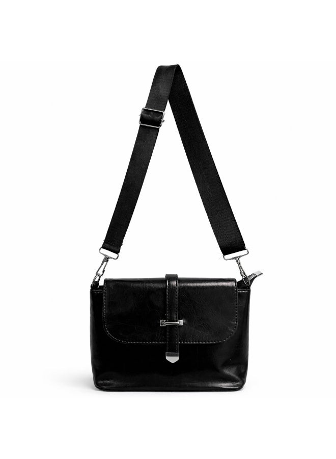 A classic women's crossbody bag crafted from premium genuine leather, featuring a stylish flap design, a distinctive silver metal clasp, and a wide, adjustable strap. - Image 5