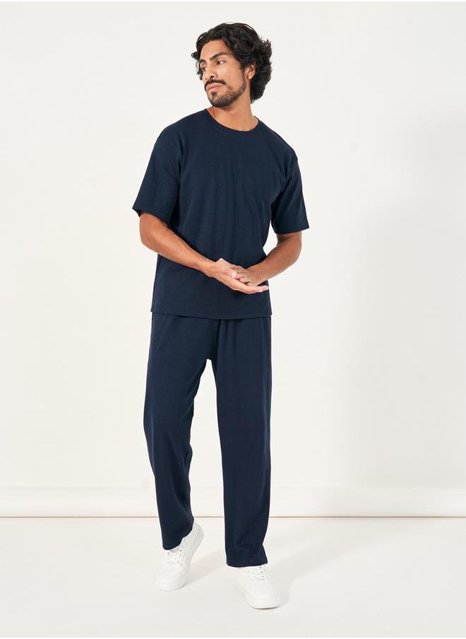 Styli - Back Print Oversized T-Shirt & Open Hem Joggers Interlock Co-Ords - Image 1