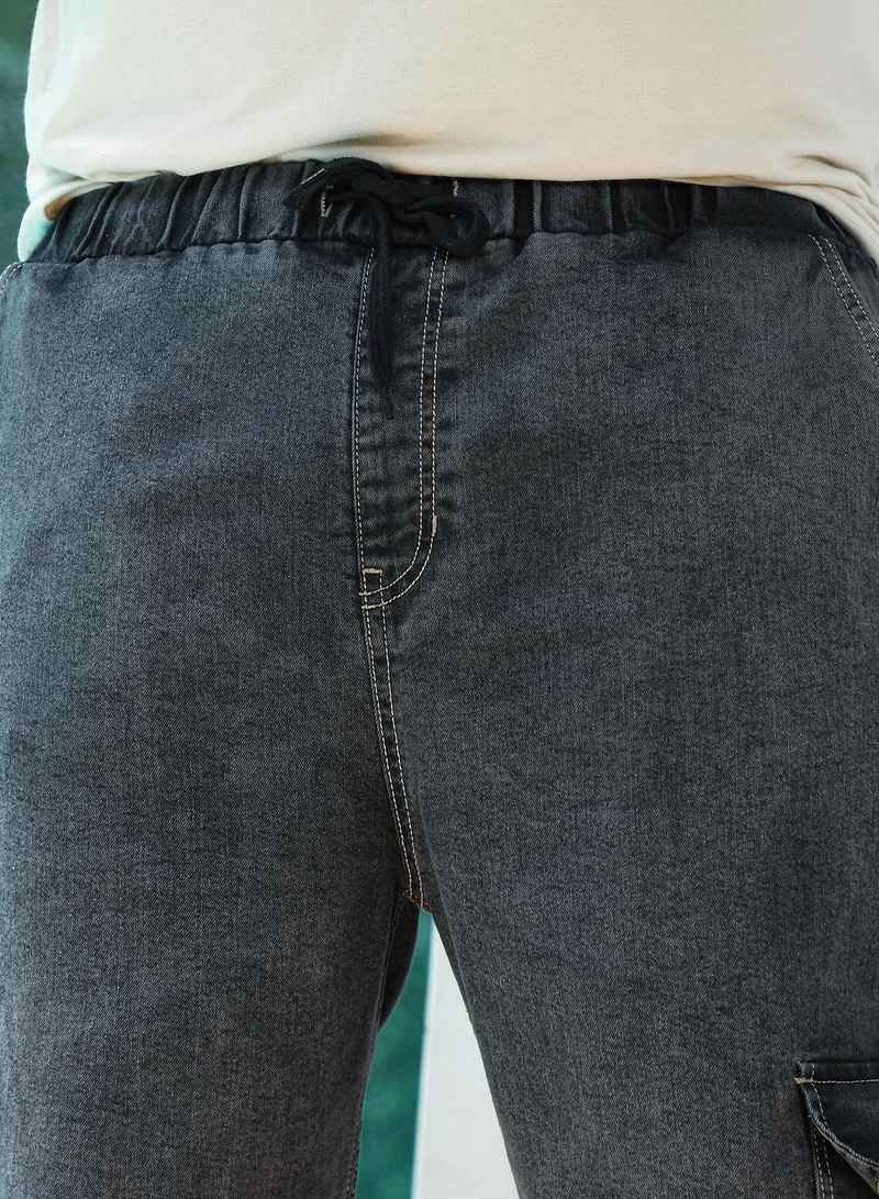 Instafab Plus  Instafab Plus Men's Charcoal Black Utility Relaxed Denim Jeans For Casual Wear | Mid-Rise | Straight Fit | Button Closure | Plus Size Denim Jeans Crafted With Comfort Fit For Everyday Wear for Men | Best Price UAE