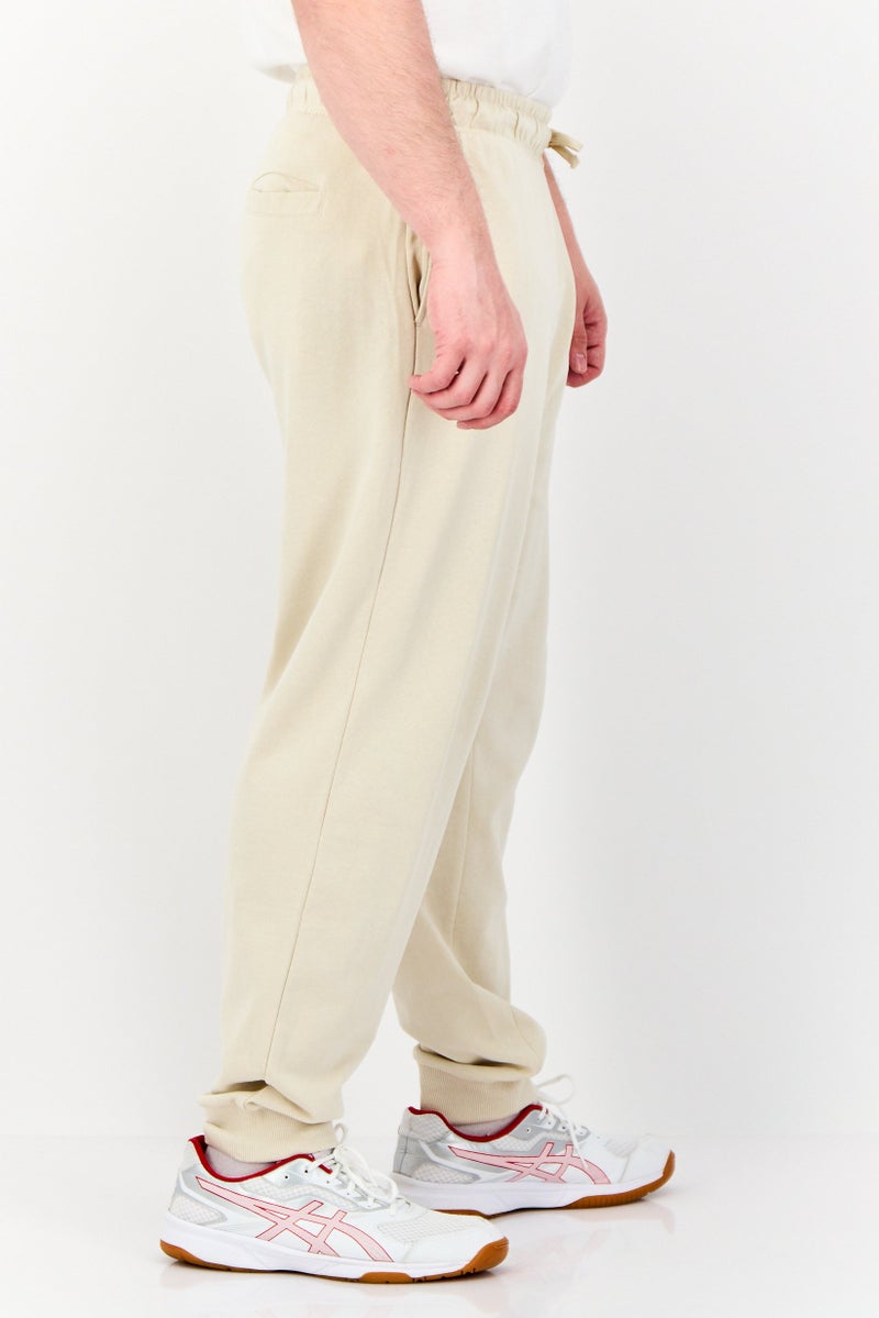 Paul Frank سروال رياضي للرجال بقصة عادية وطباعة جرافيك، بيج - Image 4